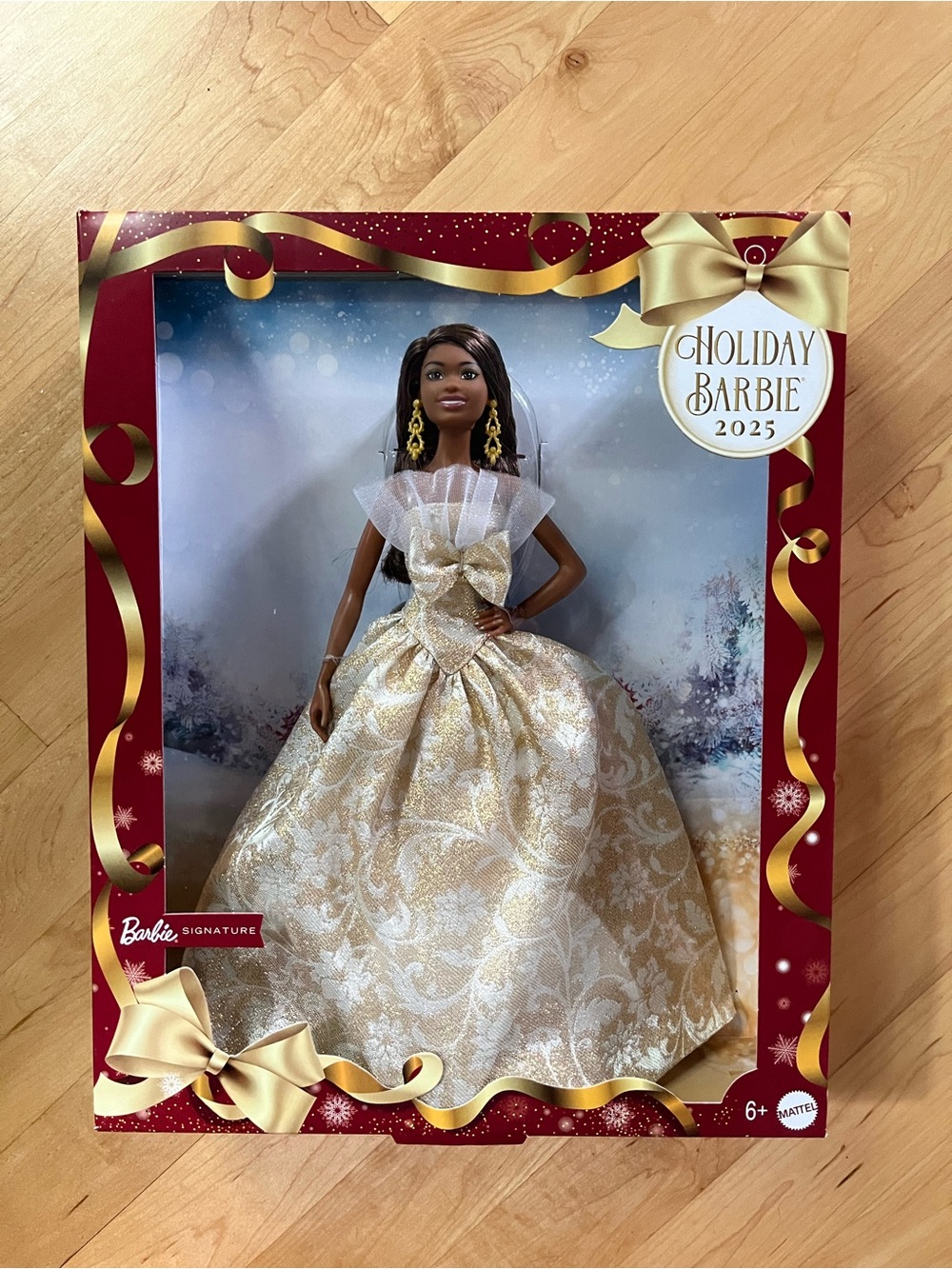 Barbie Holiday Barbie 2025 in Gold and White Brocade Gown